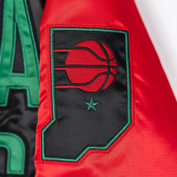 Adult Indiana Pacers 23-24' Black History Month Satin Jacket in Black by Starter in Black, Red, and Green - Zoomed in Left Arm Sleeve Indiana State logo patch View