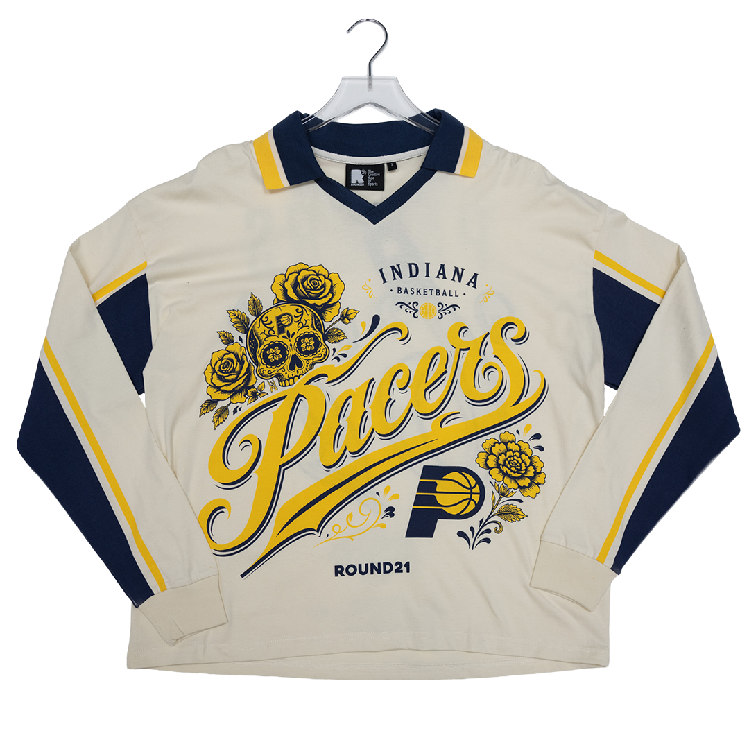 A vintage-style Indiana Pacers long-sleeve basketball jersey in cream, navy, and yellow, displayed on a hanger against a white background.