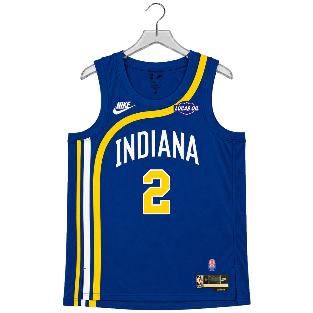 A blue Indiana Pacers basketball jersey with yellow and white accents, hanging on a gray hanger against a white background. The jersey features 'INDIANA' and the number '0' on the front, along with Nike and Lucas Oil sponsor logos.