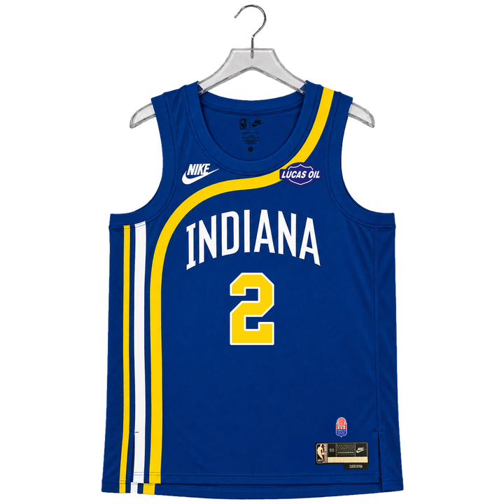 A blue Indiana Pacers basketball jersey with yellow and white accents, hanging on a gray hanger against a white background. The jersey features &