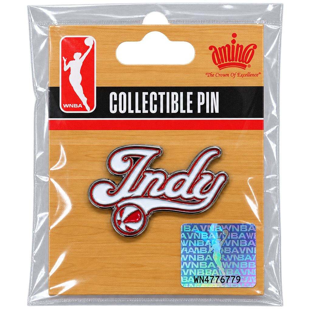 A WNBA collectible pin in its original clear plastic packaging. The pin features the word 'Indy' in white cursive with a red outline, surrounding a red basketball with a white stripe.