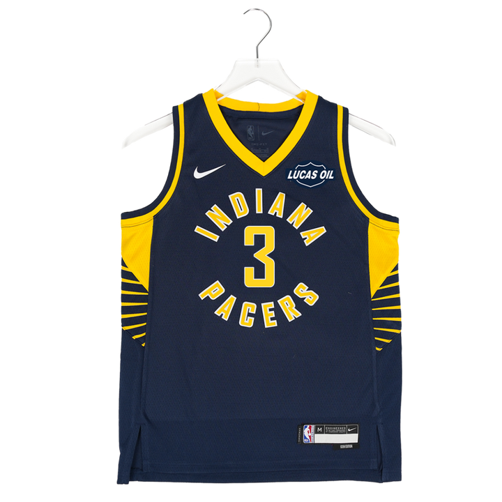 Navy blue basketball jersey with yellow accents on a hanger