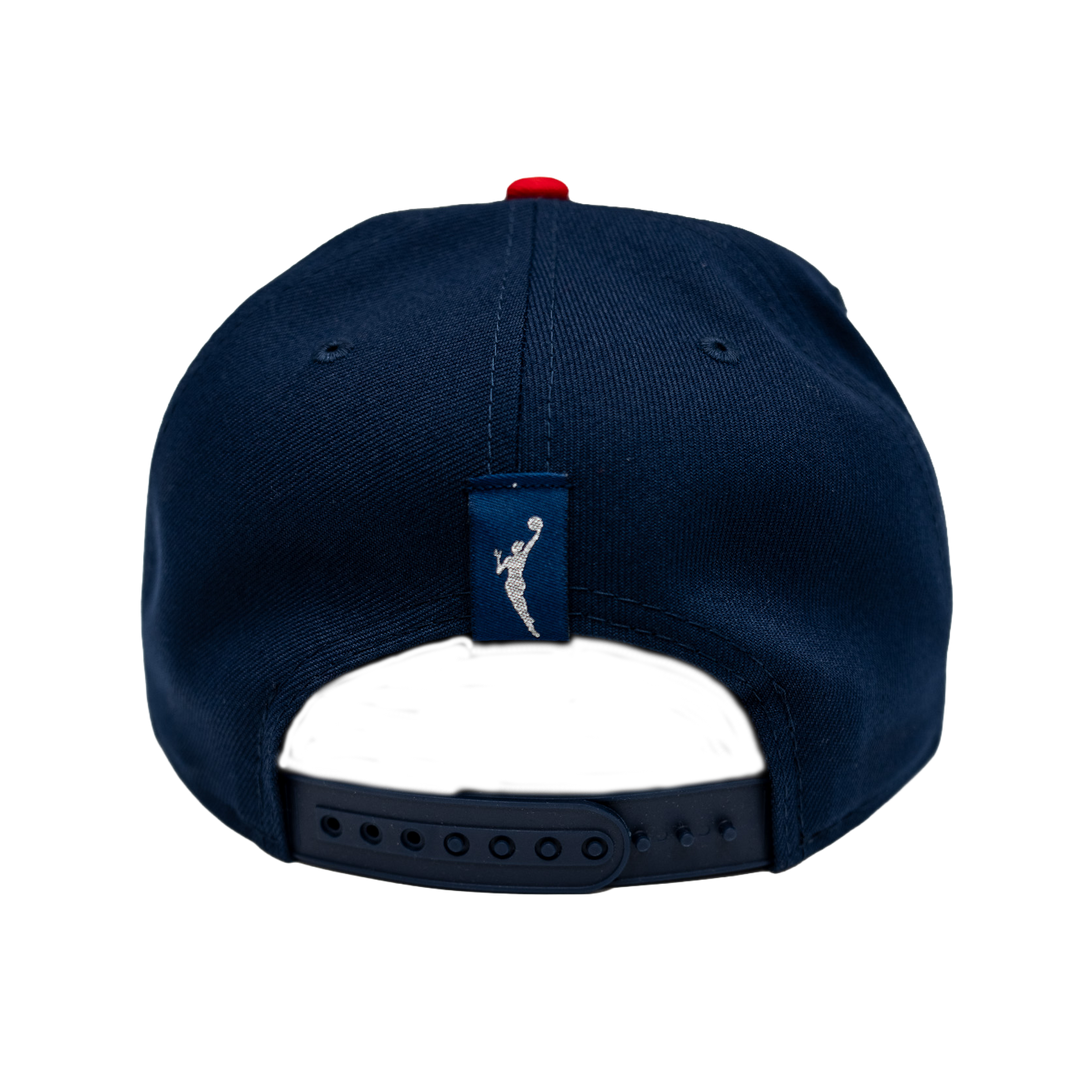 Navy blue cap with a logo on the back against a white background