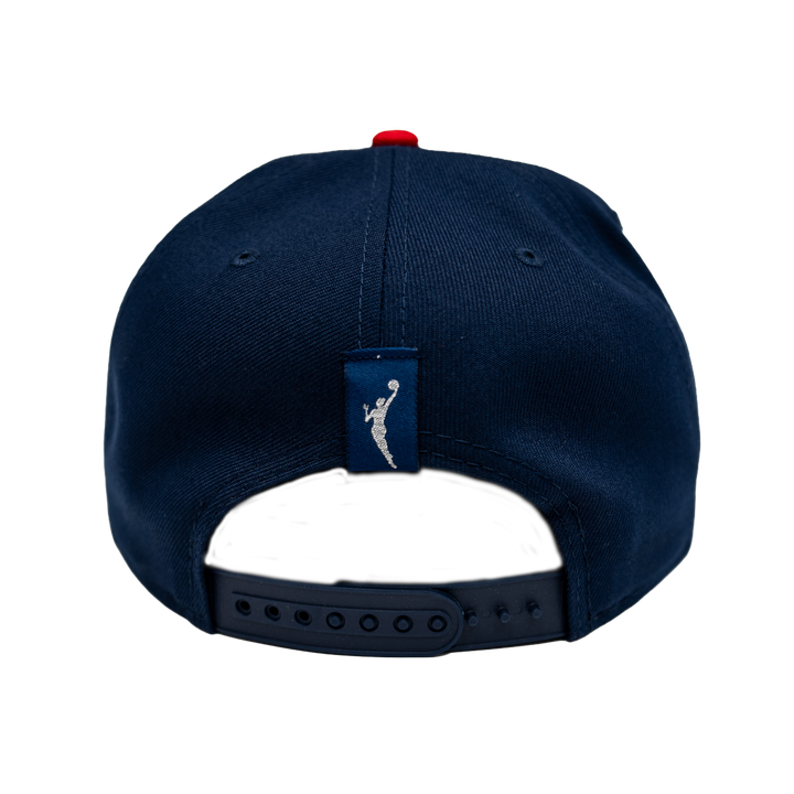 Navy blue cap with a logo on the back against a white background