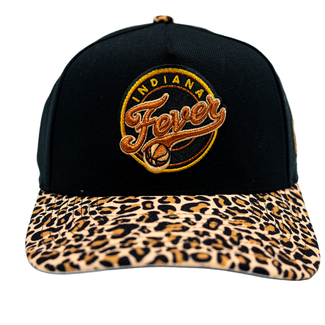 A black baseball cap with a leopard-print brim and a circular embroidered 'Indiana Fever' logo on the front, shown against a plain white background.