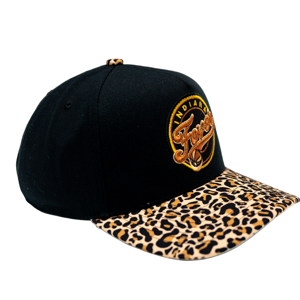 A black baseball cap with a leopard-print brim and a circular embroidered 'Indiana Pacers' logo on the front, shown against a plain white background.