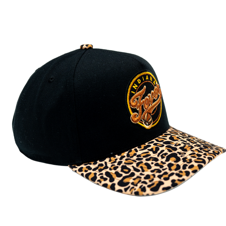 A black baseball cap with a leopard-print brim and a circular embroidered 'Indiana Pacers' logo on the front, shown against a plain white background.