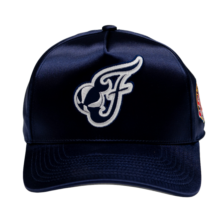 Navy blue cap with a white logo on a white background