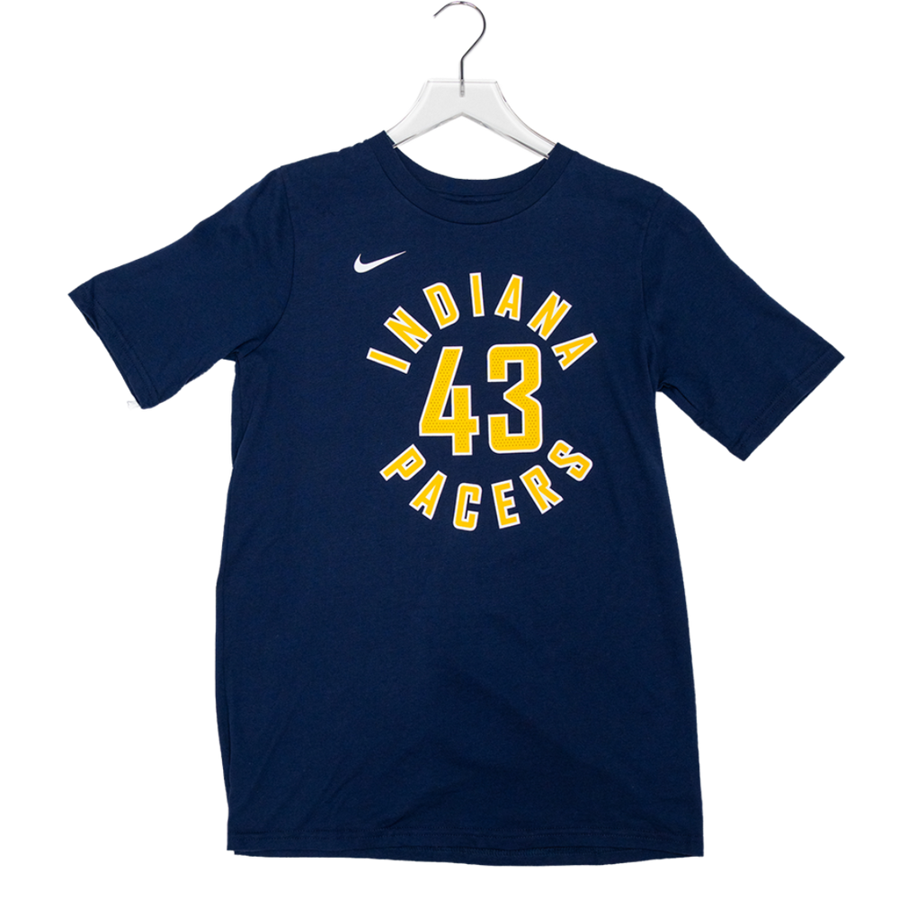 A navy blue short-sleeve t-shirt hanging on a white plastic hanger against a white background. The shirt features a yellow and white graphic on the front with the text 'INDIANA 43 PACERS' and a small white Nike swoosh logo on the left chest.